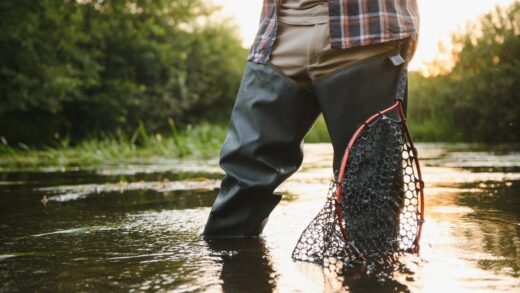 fisherman catches a trout on the river in summer 2025 03 13 13 11 06 utc